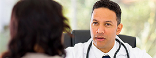A doctor in conversation with a patient